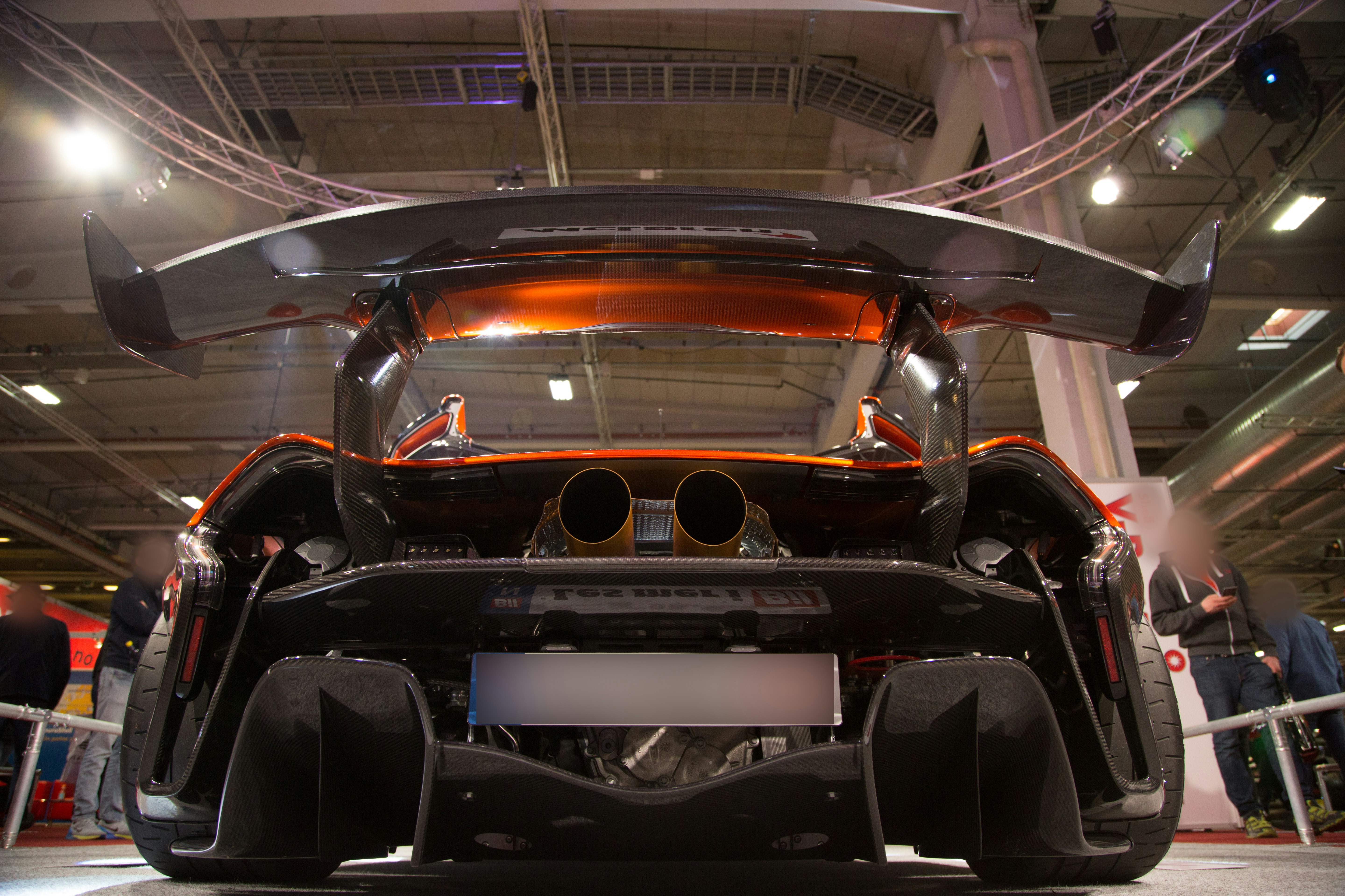 black and red car in a room